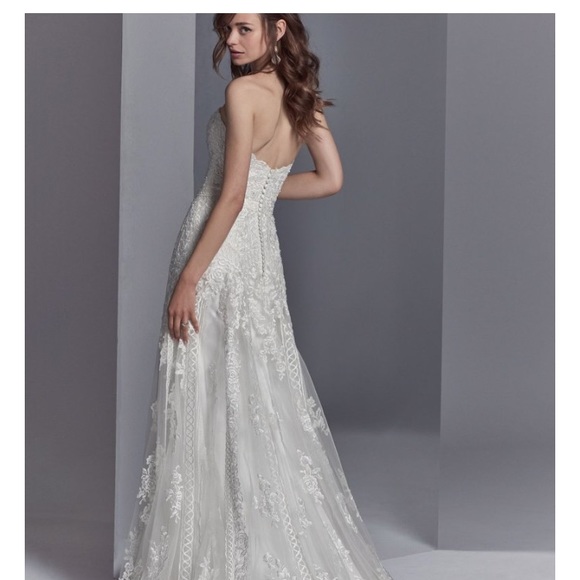 Skylar Wedding Dress
By Sottero and Midgley - Picture 2 of 12